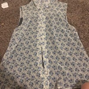 Vest looking shirt.